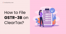 Illustration of a woman standing beside a large tax form checklist with the text 'How to File GSTR-3B on ClearTax?' on a pink background, Techjockey logo on top