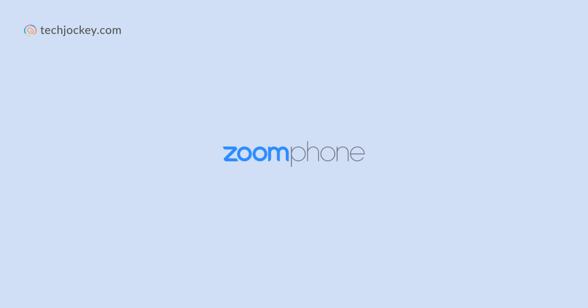 Zoom Phone logo displayed on a light blue background with techjockey.com branding in the corner.