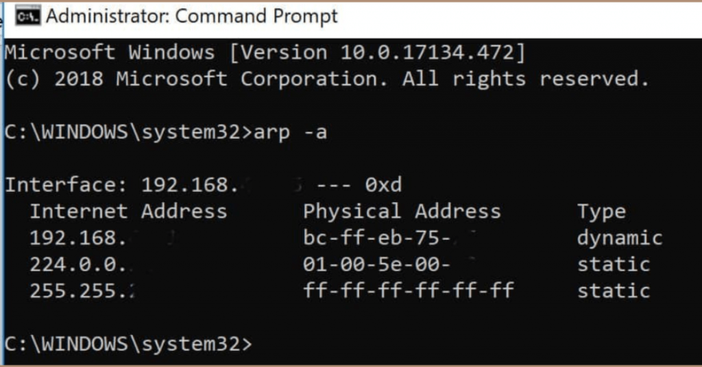 Screenshot of Windows Command Prompt displaying ARP cache entries using the arp -a command with IP addresses, MAC addresses, and connection types.
